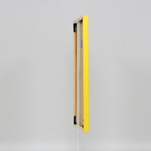 Kunst effect puzzellijst acrylglas geel 70x100 cm kunststof lijst elegant